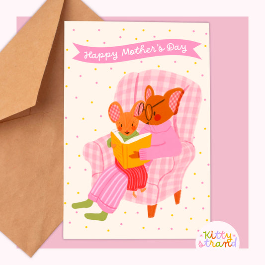 Sweet Mother's day card with an illustration of a mother mouse and baby mouse reading a book together in a gingham armchair