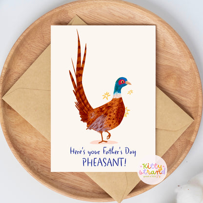 Father's Day card with a pheasant illustration on a wooden plate with an envelope.