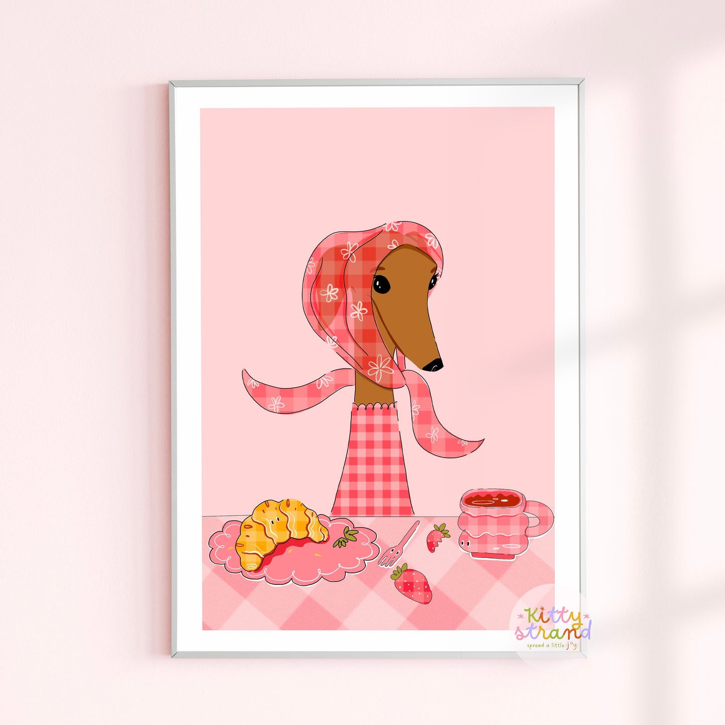 dog art print in pink with a dog wearing a gingham scarf and jumper with a croissant, strawberries  and cup of coffee 