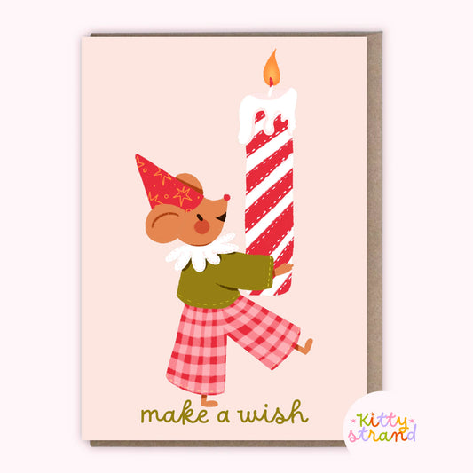 Birthday card with a mouse holding a candle and text reading make a wish with a birthday candle 
