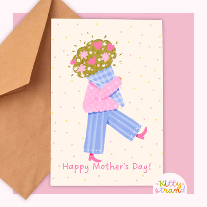Mother's Day card with a woman holding flowers and 'Happy Mother's Day!' text, featuring a brown envelope.