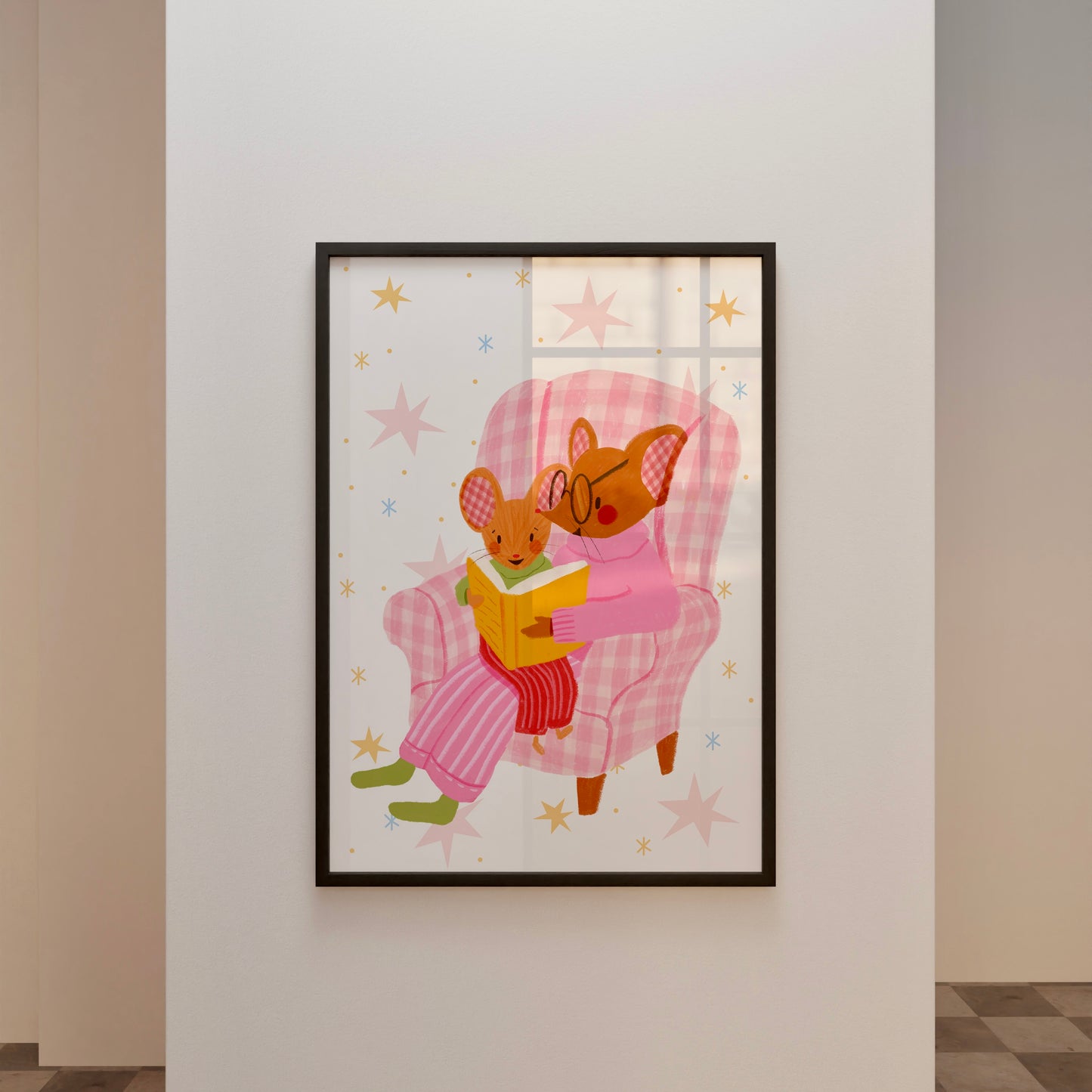 wall art with an illustration of two mice reading a book in a checkered chair with a pink background. Children's book inspired wall decor
