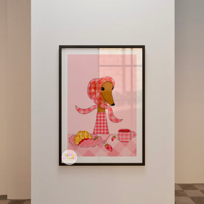 Framed illustration of a dog wearing a pink checkered headscarf on a pink background, displayed on a wall.
