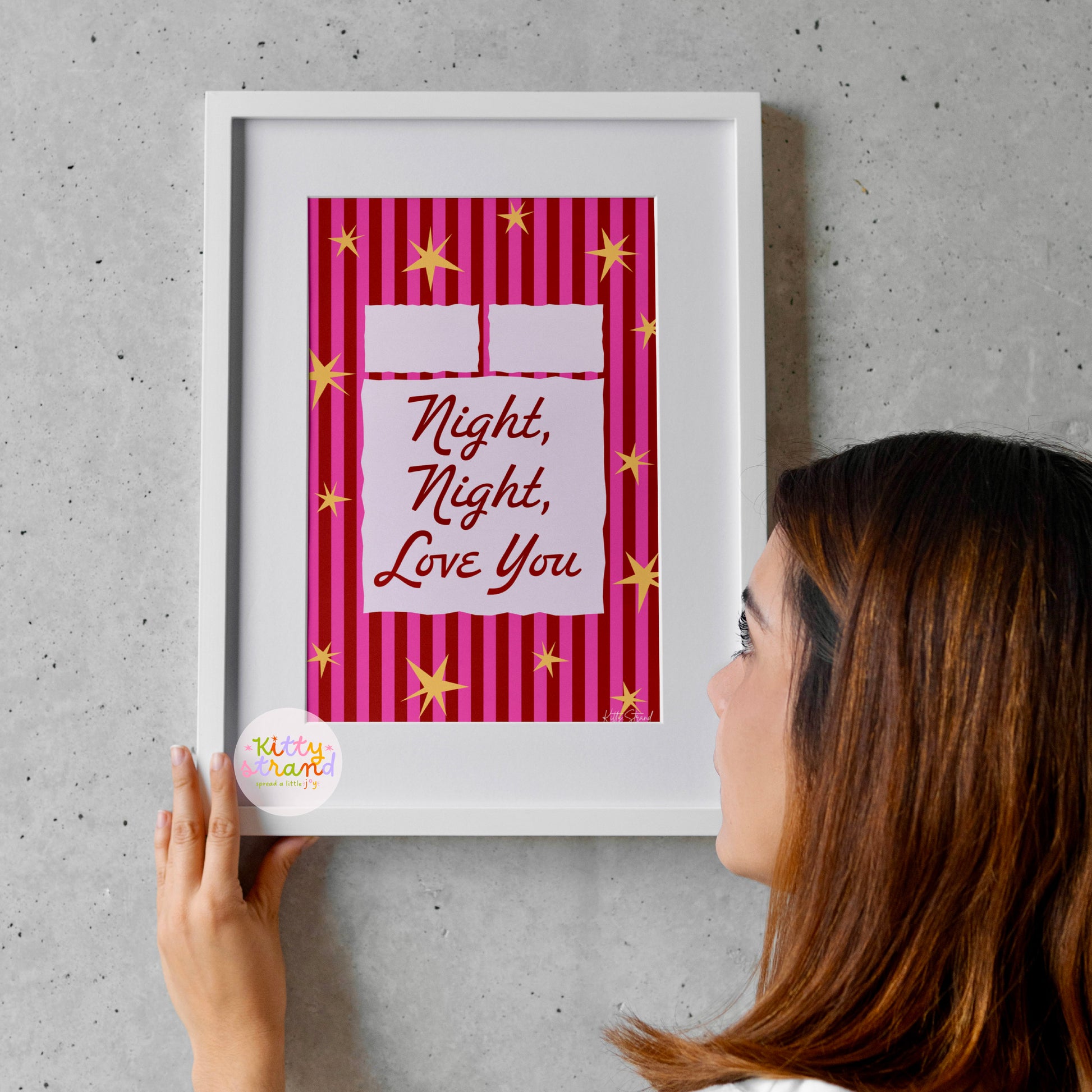 Pink bed themed wall art with a pink striped background and an illustration of a bed with the quote "Night Night, Love You" in cursive writing