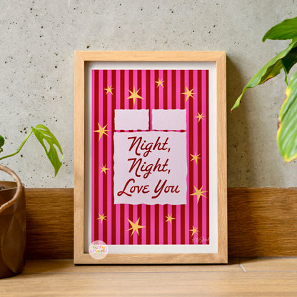 Framed artwork with 'Night, Night, Love You' text on a pink striped background.